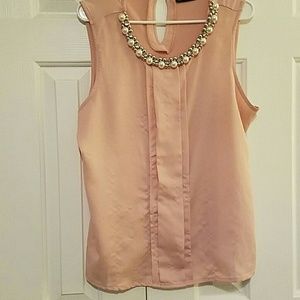 Light pink jeweled blouse